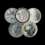 Five silver coins with different designs on a black background
