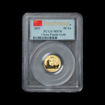 Chinese Gold coin in a protective holder with 'First Strike' and 'PCGS MS70' labels on a black background
