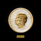 Gold coin with a profile of a king on a black background