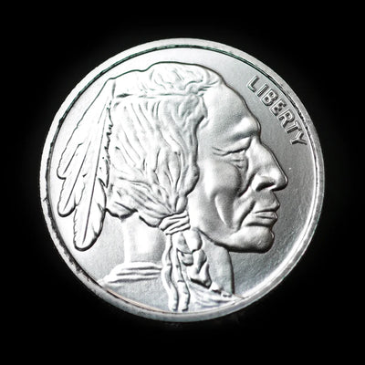A 1 oz silver round with an embossed design featuring a profile of a Native American chief on one side and the image of a buffalo on the reverse, with the word 'LIBERTY' arched at the top.